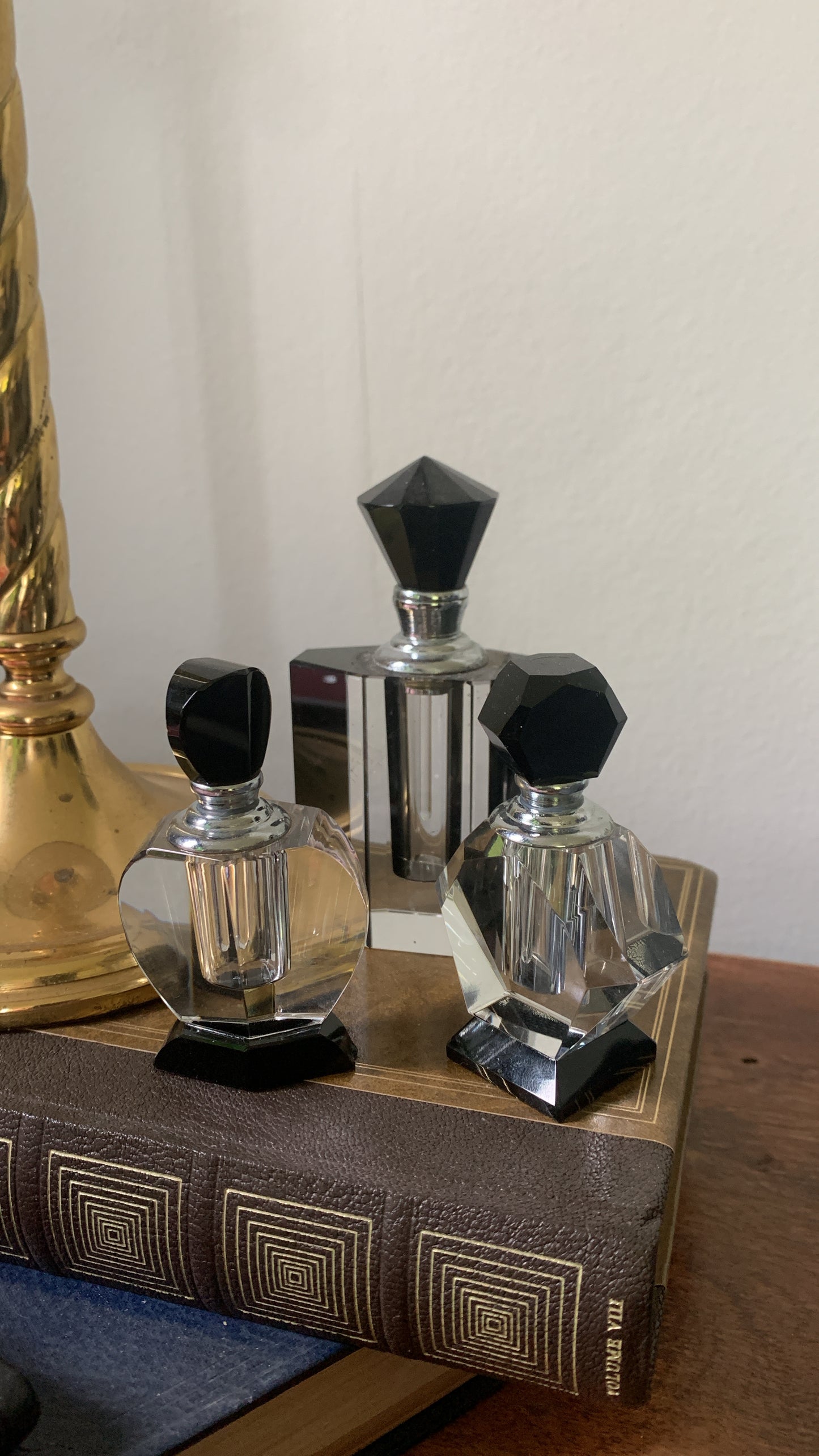 Three vintage glass bottles