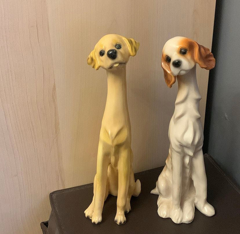 Two vintage long neck dogs